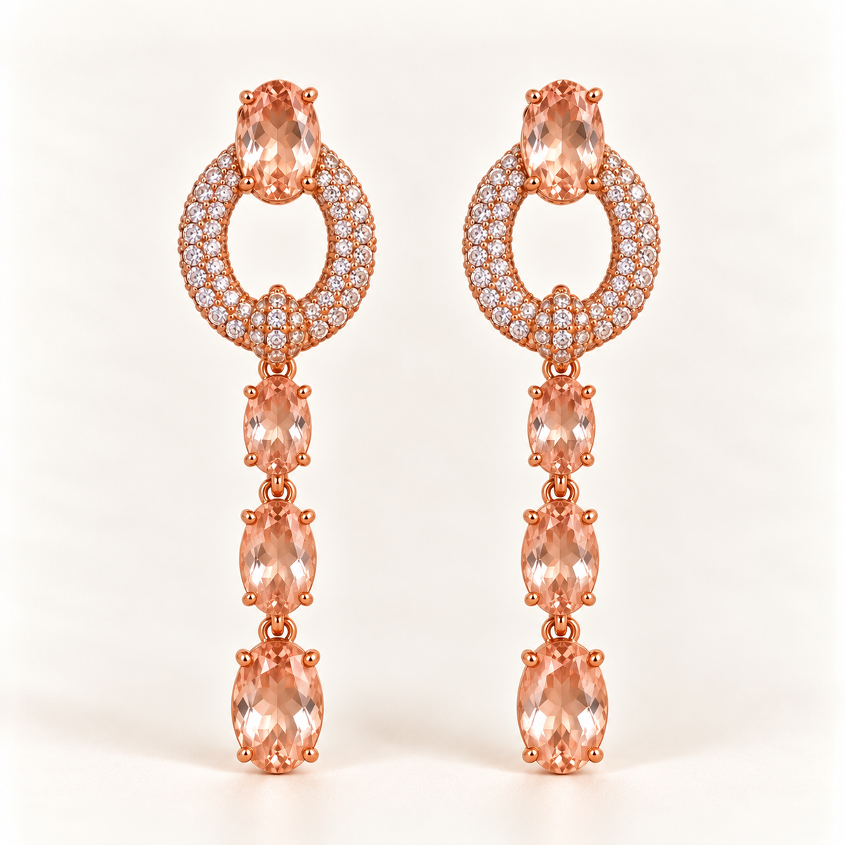 BRINCO FESTA ROSÉ CRAVEJADO OVAL VAZADO ZIRÔNIAS TRIPLA