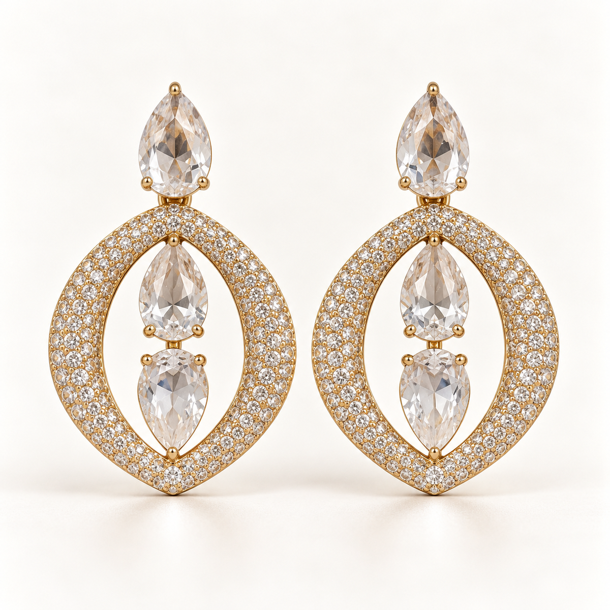 BRINCO FESTA DOURADO CRAVEJADO GOTA ZIRCÔNIA VAZADO