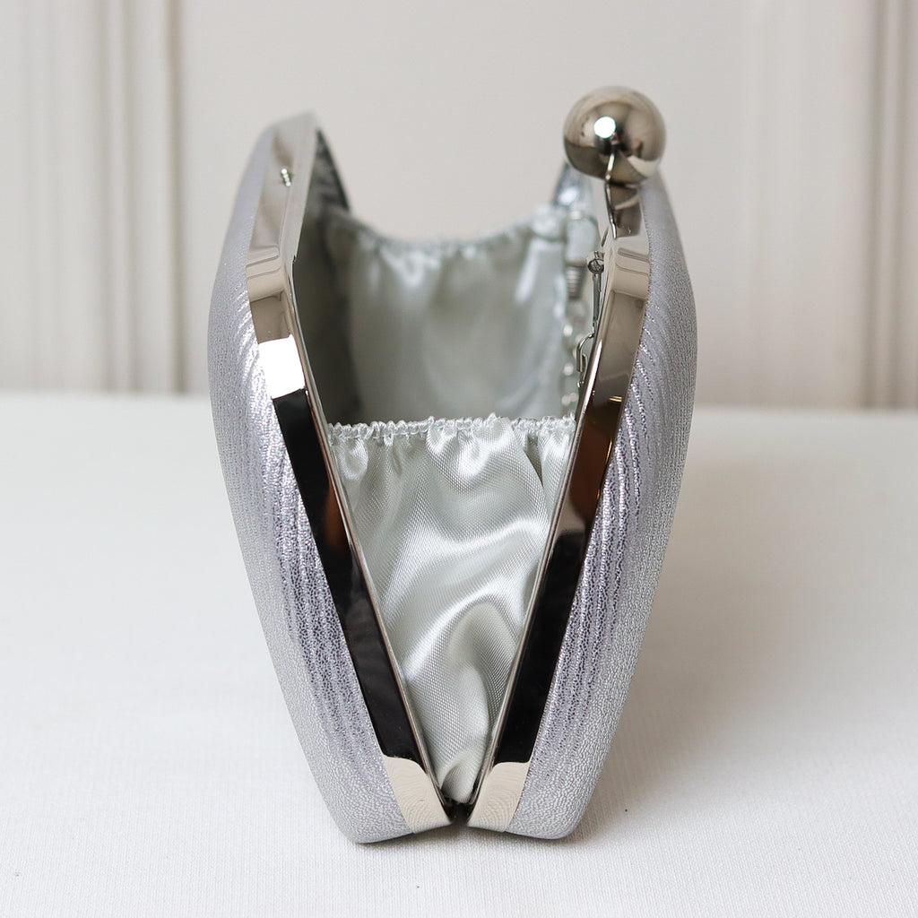 CLUTCH LISA TEXTURA FORMATO RETANGULAR PONTA ARREDONDADA