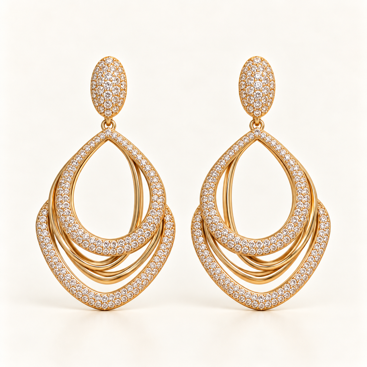 BRINCO FESTA DOURADO CRAVEJADO GOTA VAZADO