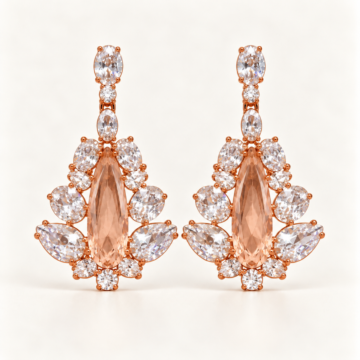 BRINCO FESTA ROSÉ FORMATO GOTA ZIRCONIAS BRANCA LADO BASE OVAL