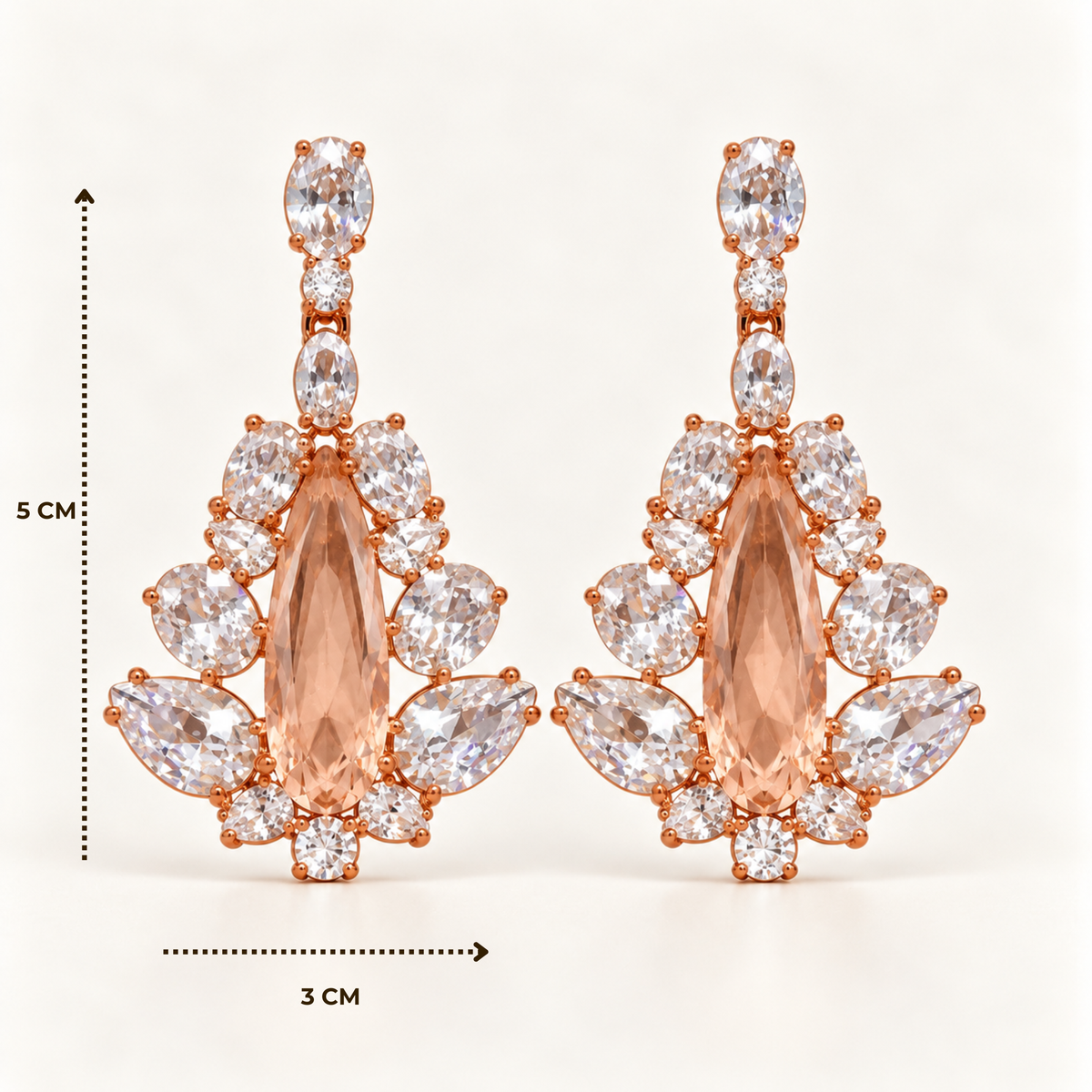 BRINCO FESTA ROSÉ FORMATO GOTA ZIRCONIAS BRANCA LADO BASE OVAL