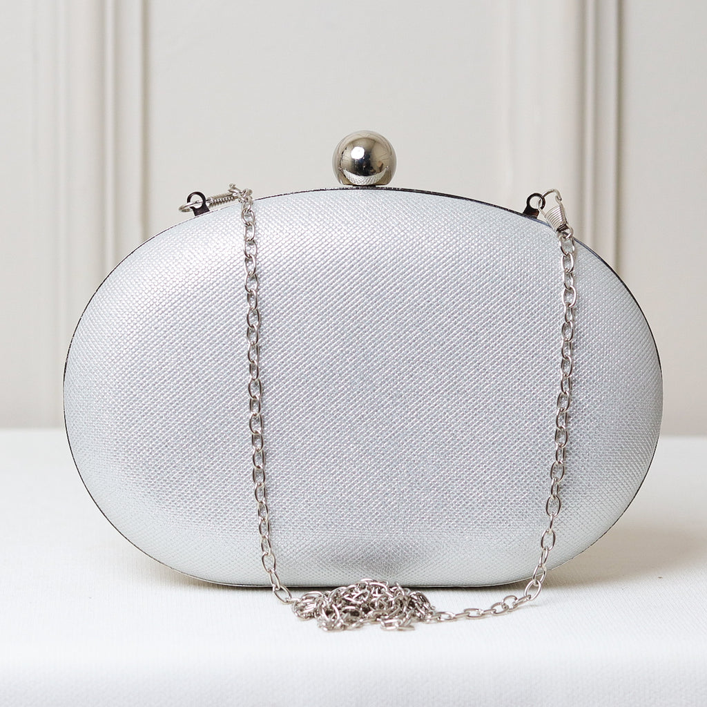 CLUTCH BRILHO TEXTURA FORMATO OVAL FECHO ESFERA