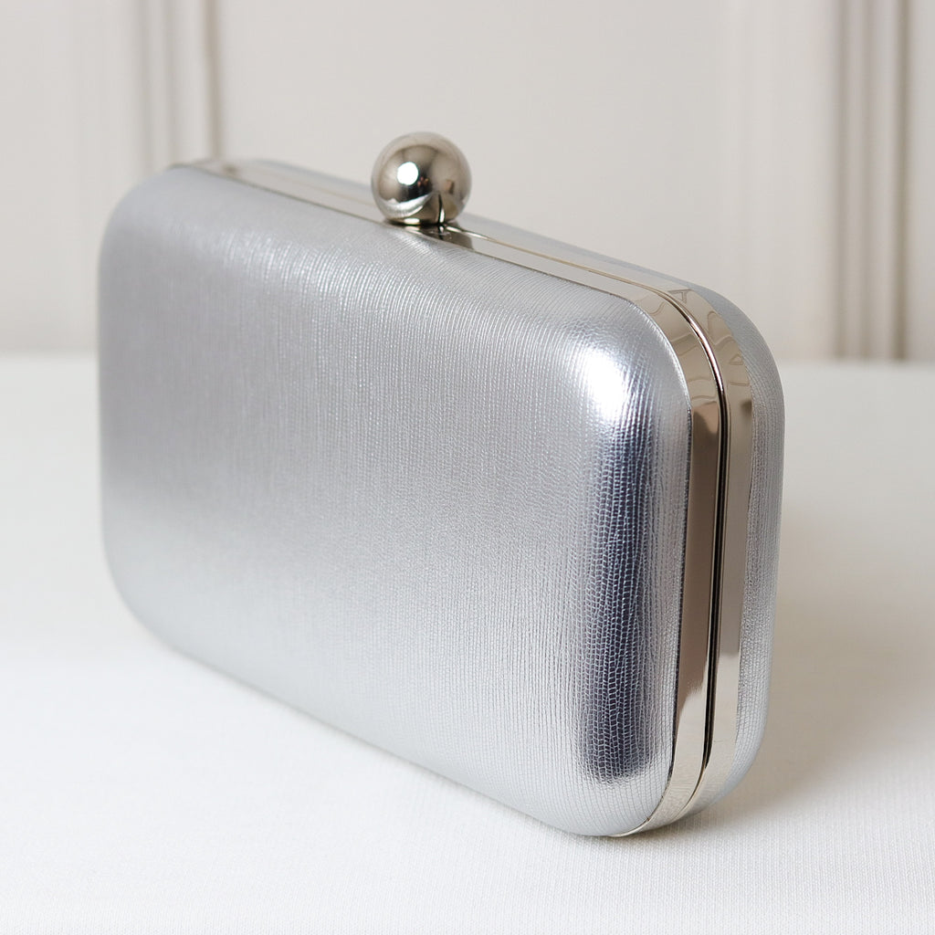 CLUTCH LISA TEXTURA CRAQUELADA FORMATO RETANGULAR FECHO ESFERA