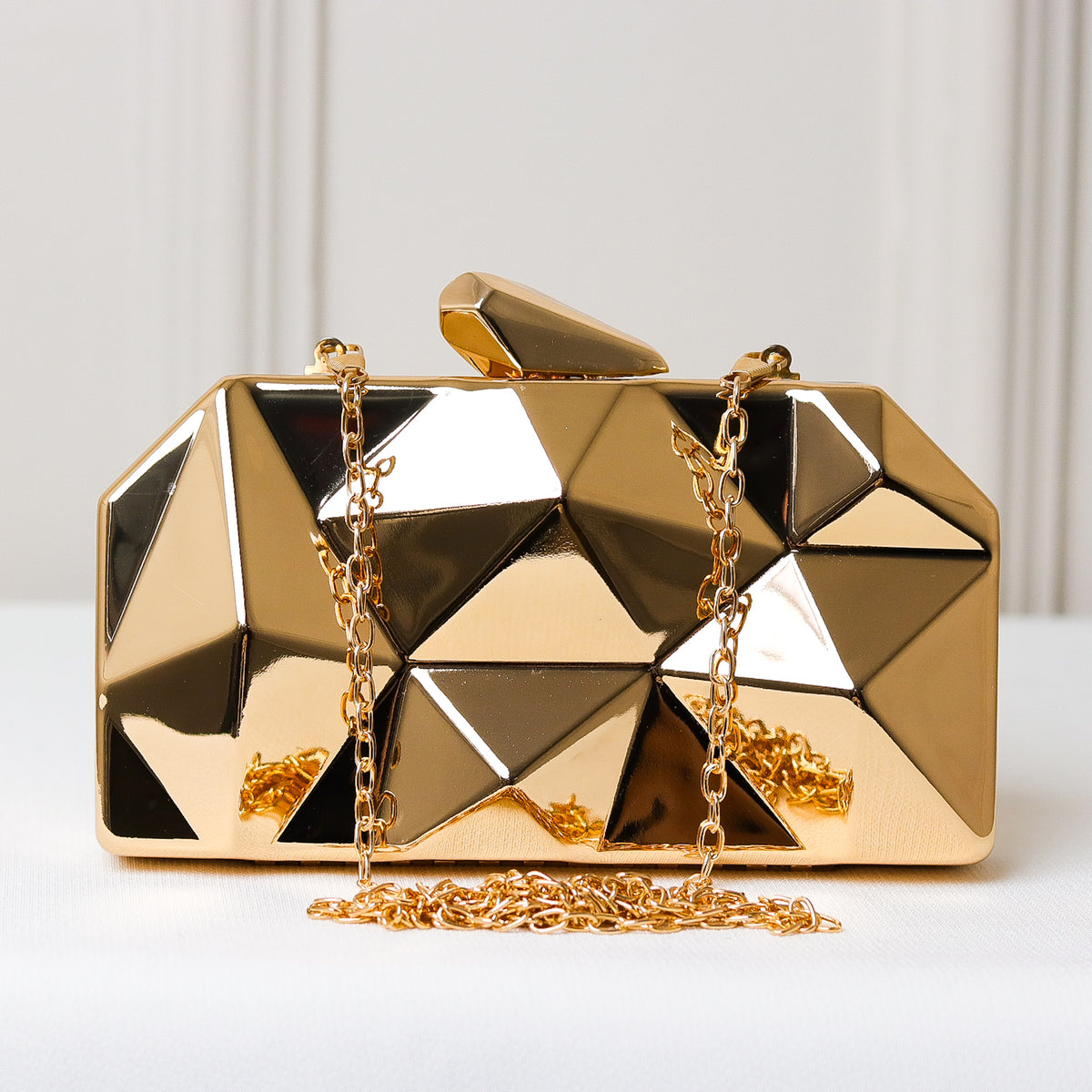CLUTCH METALIZADA GEOMETRICA FORMATO RETANGULAR