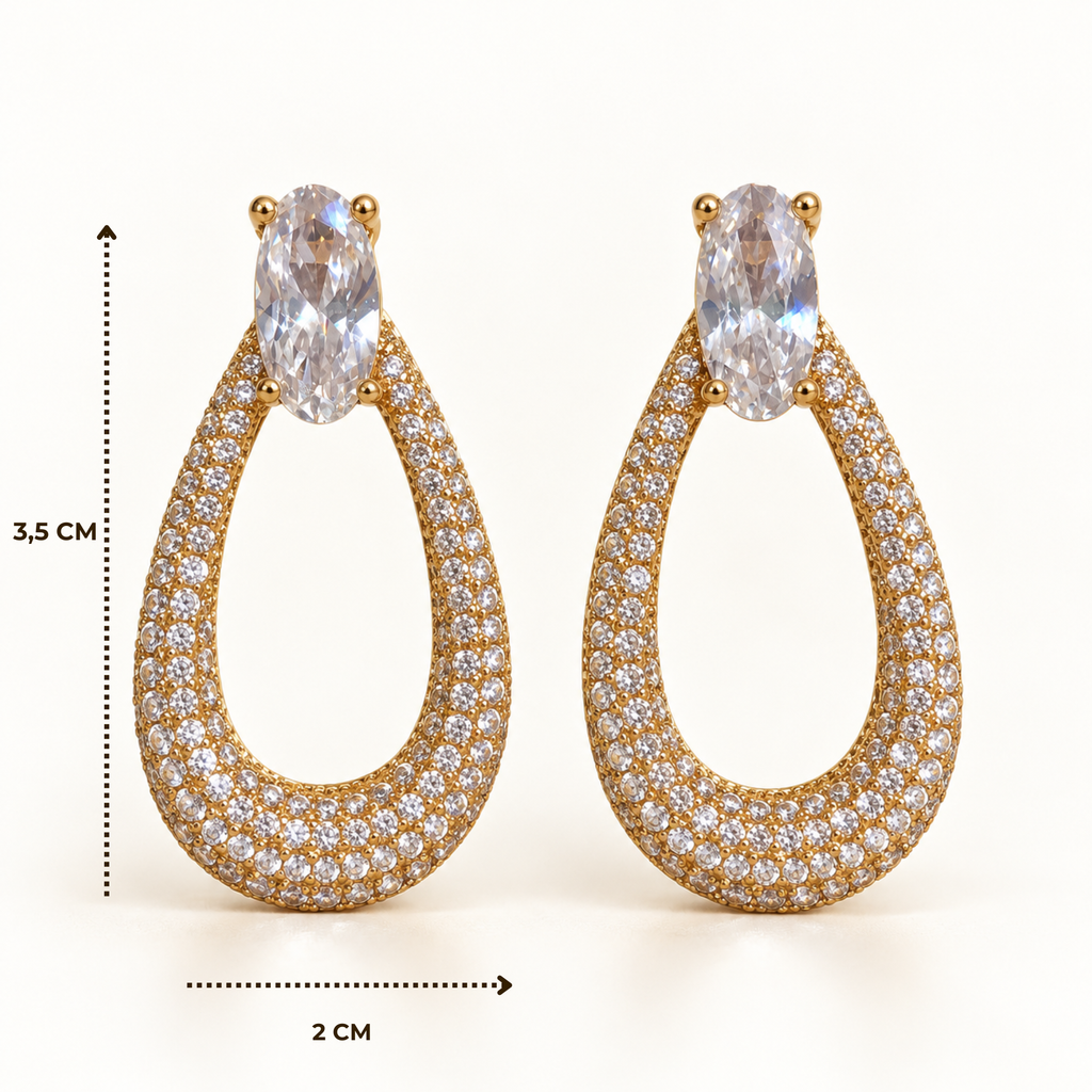 BRINCO FESTA DOURADO CRAVEJADO BASE ZIRCÔNIA OVAL