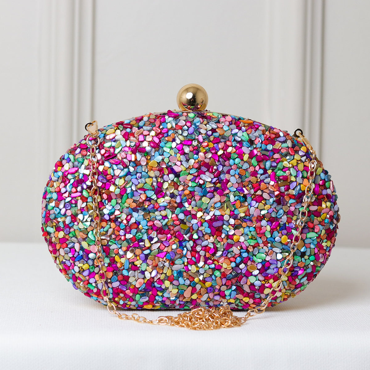 CLUTCH MULTICOLORIDA TEXTURA PEDRARIA BRILHANTE