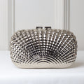 CLUTCH METALIZADA FORMATO CONCHA PONTILHADA RETANGULAR