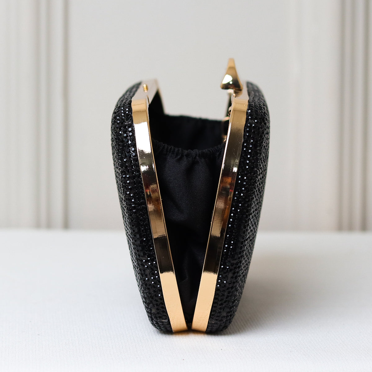 CLUTCH BRILHO STRASS FORMAS OVAL FECHO RETO