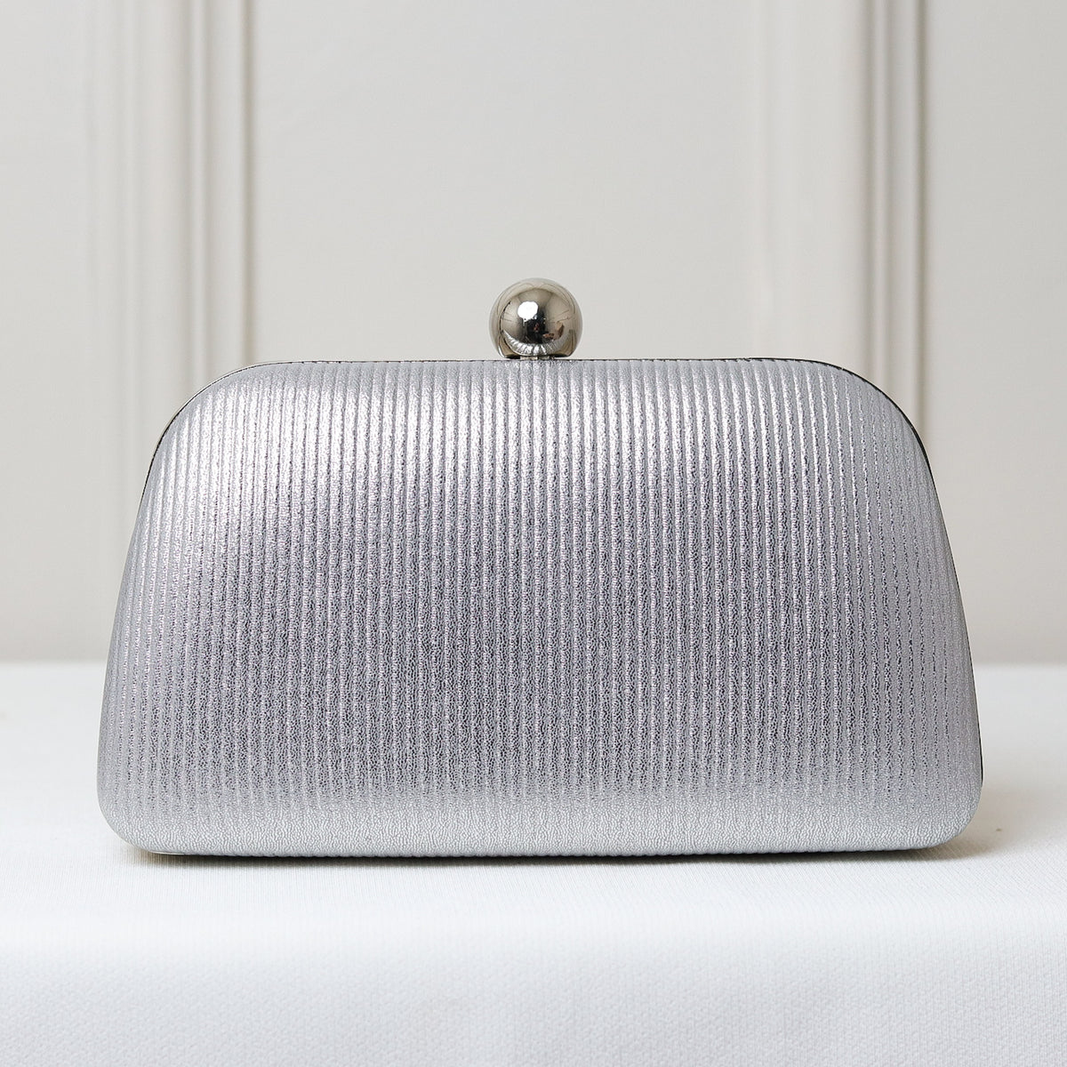 CLUTCH LISA TEXTURA FORMATO RETANGULAR PONTA ARREDONDADA