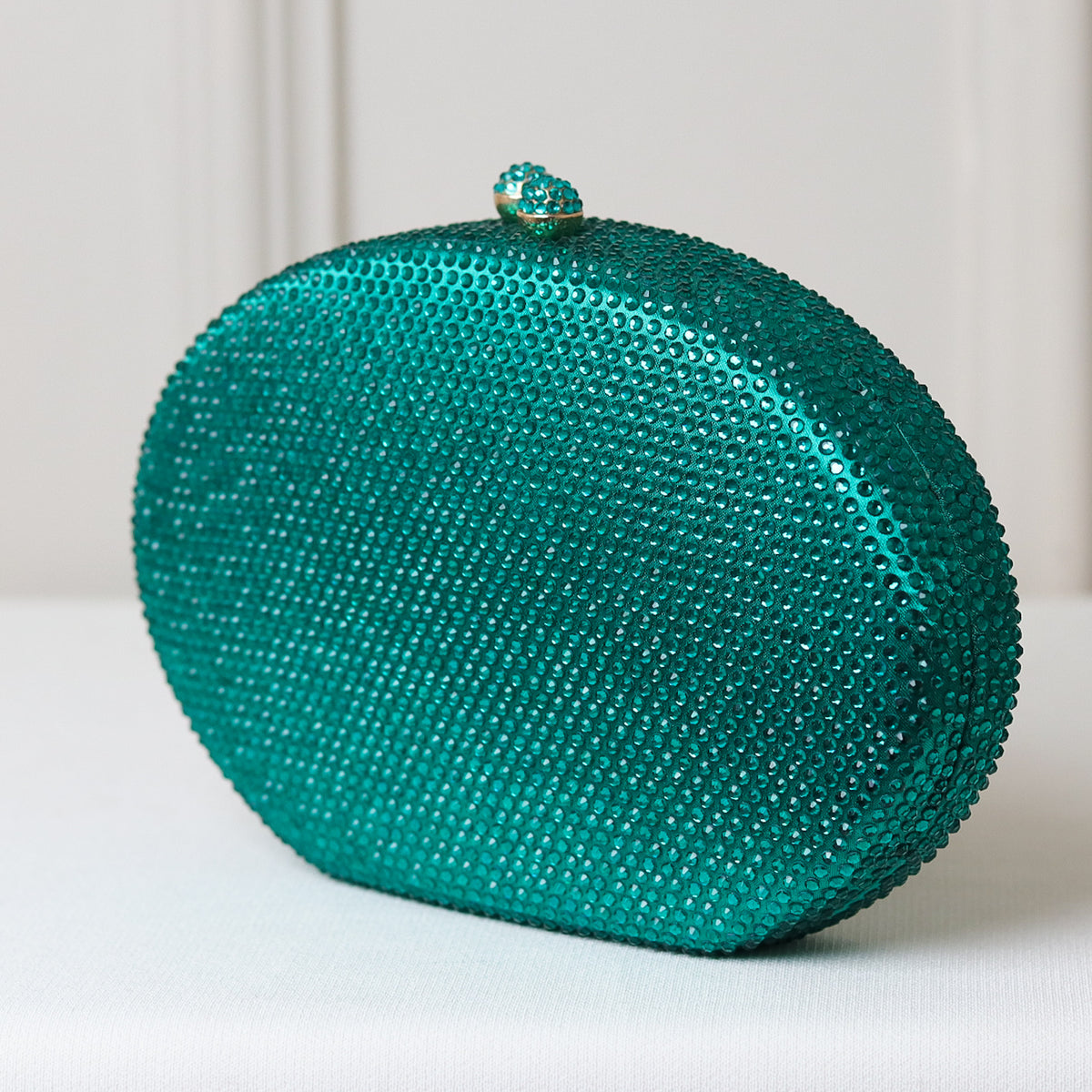 CLUTCH BRILHO STRASS FORMATO OVAL FECHO ESFERA DUPLA