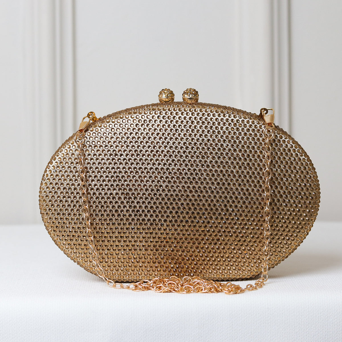 CLUTCH BRILHO STRASS FORMATO OVAL FECHO ESFERA DUPLA