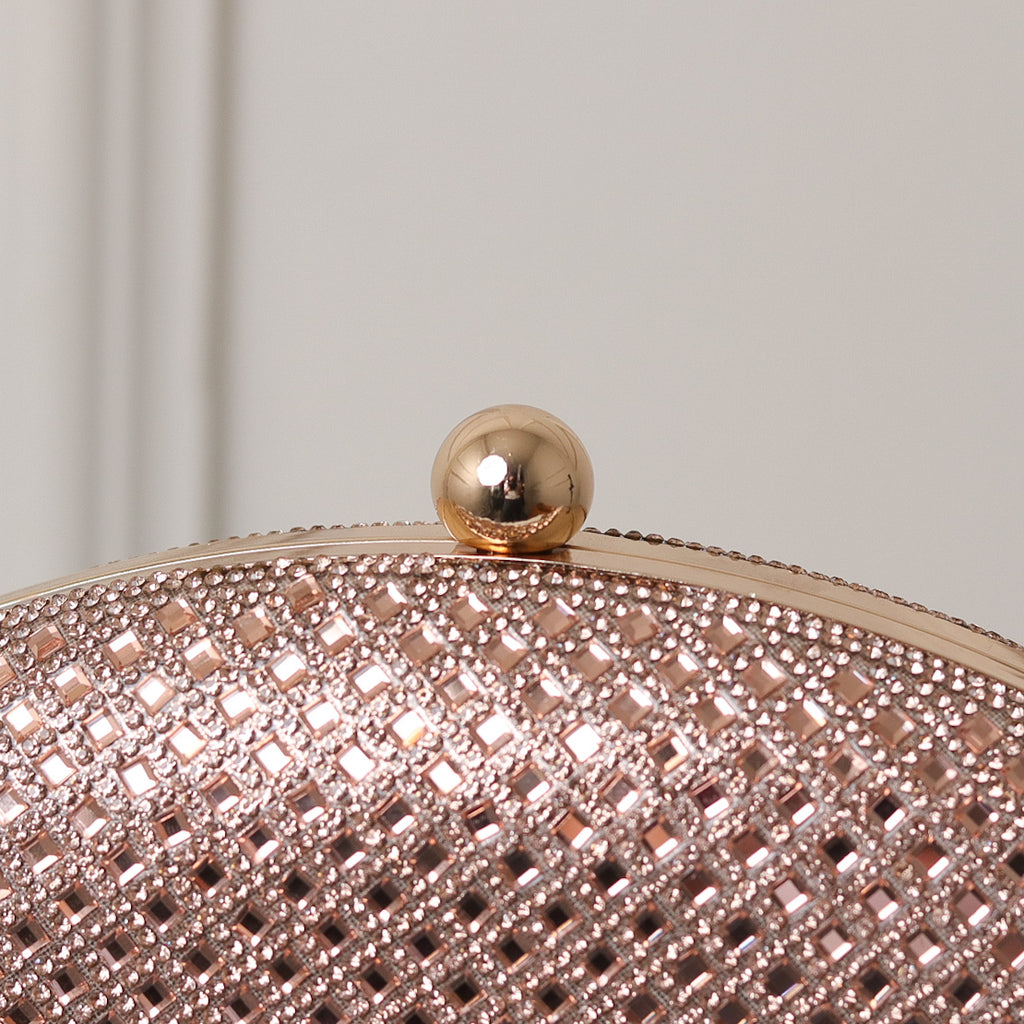 CLUTCH BRILHO TEXTURA STRASS FORMATO OVAL FECHO ESFERA