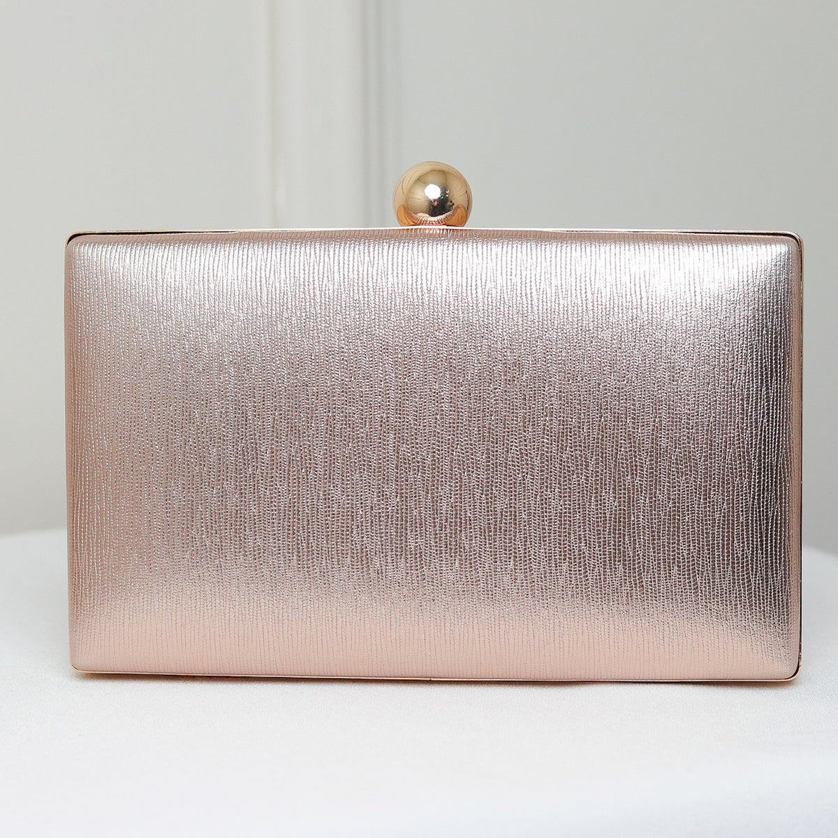 CLUTCH TEXTURA LINHAS FORMATO RETANGULAR FECHO ESFERA