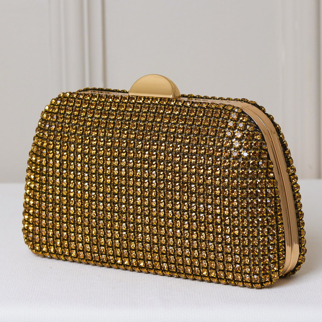 CLUTCH ONIX/PRETO/DOURADA/PRATA/BRONZE BRILHO TEXTURA STRASS FUNDO BRILHO FORMATO OVAL FECHO RETO