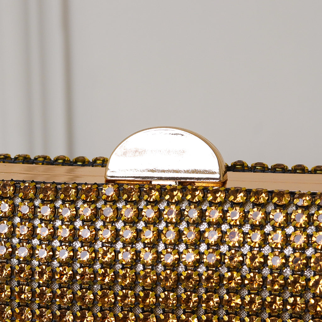 CLUTCH ONIX/PRETO/DOURADA/PRATA/BRONZE BRILHO TEXTURA STRASS FUNDO BRILHO FORMATO OVAL FECHO RETO