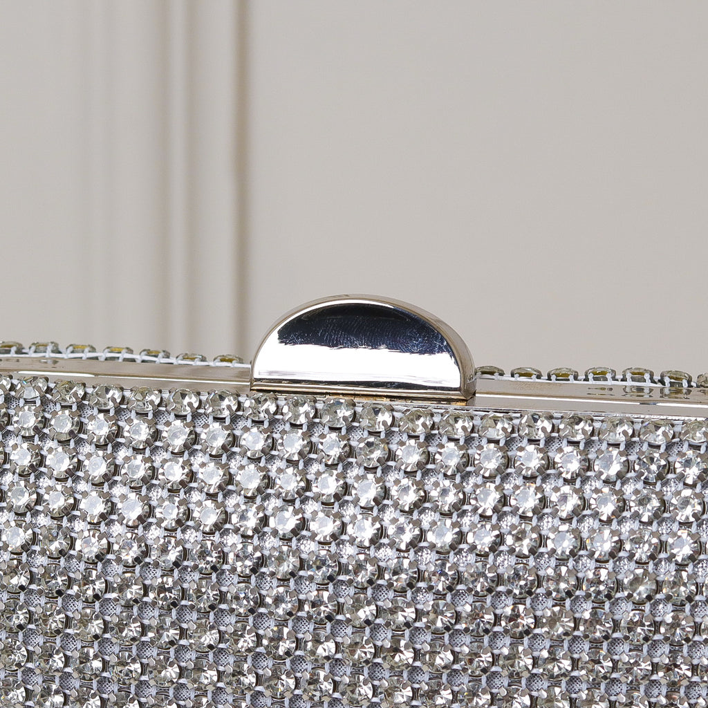 CLUTCH ONIX/PRETO/DOURADA/PRATA/BRONZE BRILHO TEXTURA STRASS FUNDO BRILHO FORMATO OVAL FECHO RETO