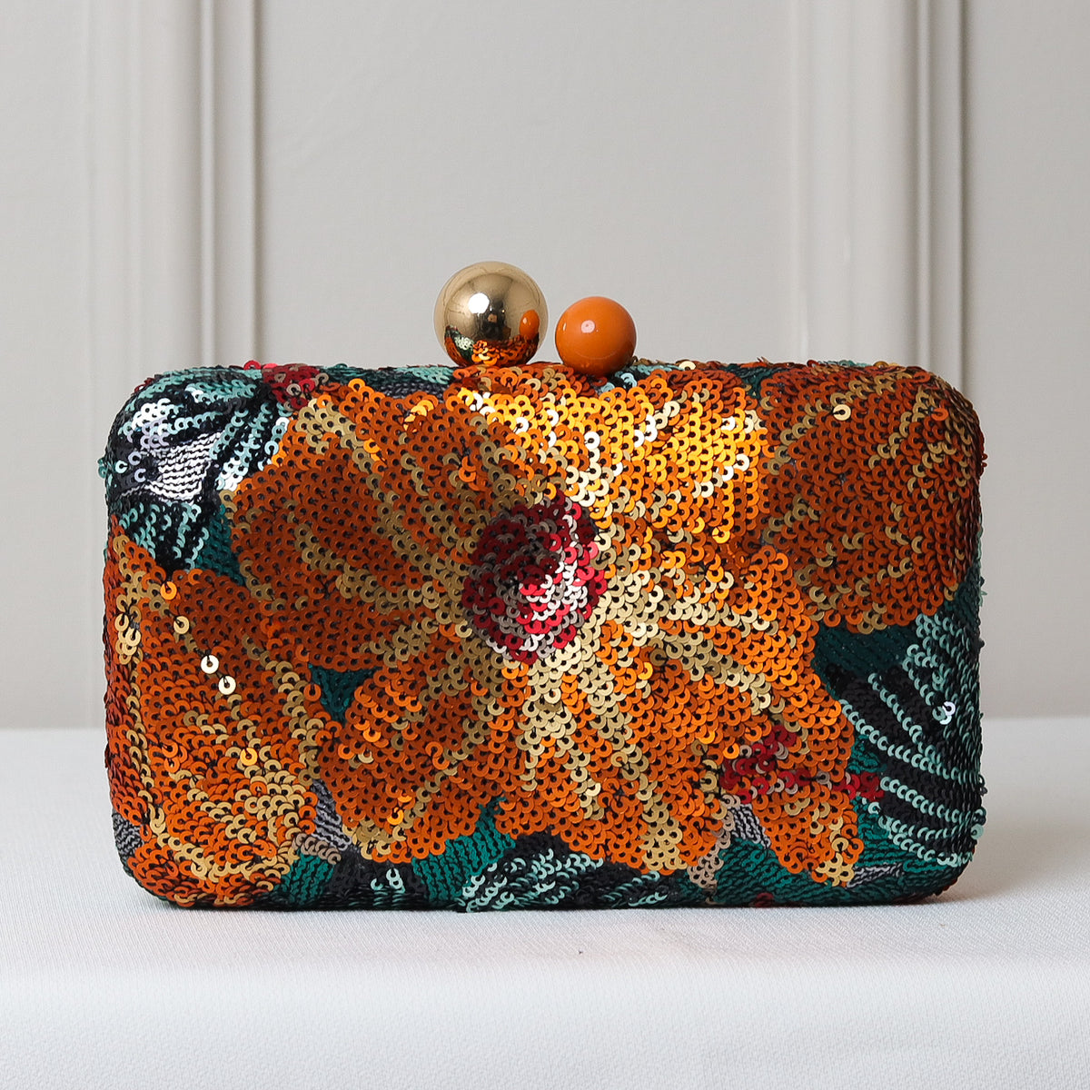CLUTCH BORDADA FLORES FORMATO RETANGULAR FECHO ESFERA DUPLA BICOLOR