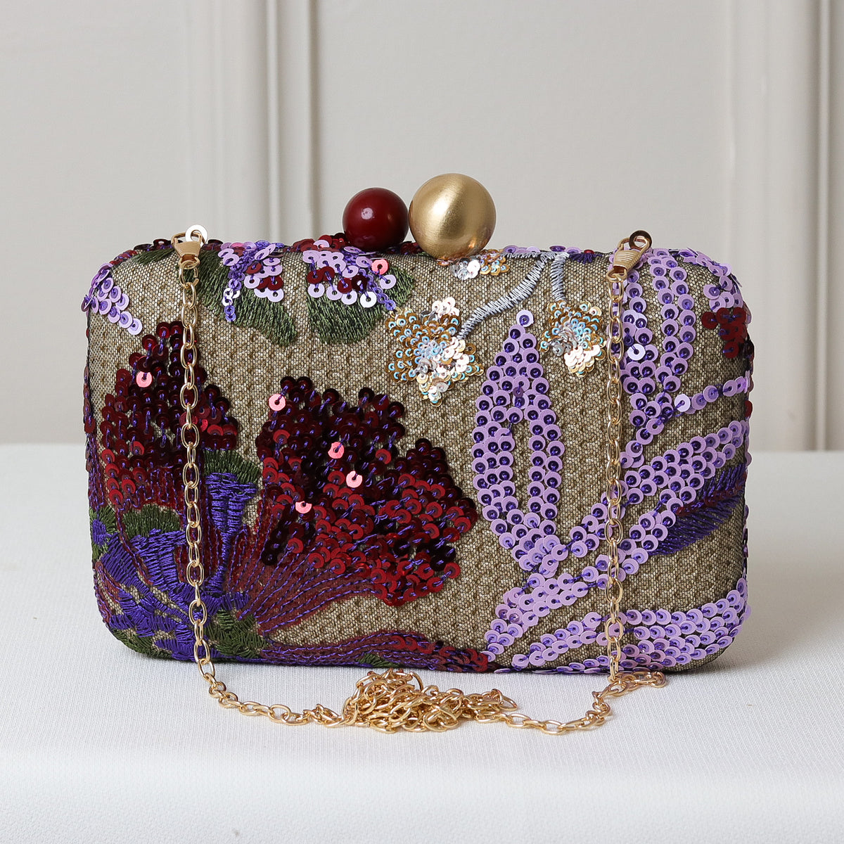 CLUTCH BORDADA FLORES FORMATO RETANGULAR FECHO ESFERA DUPLA BICOLOR