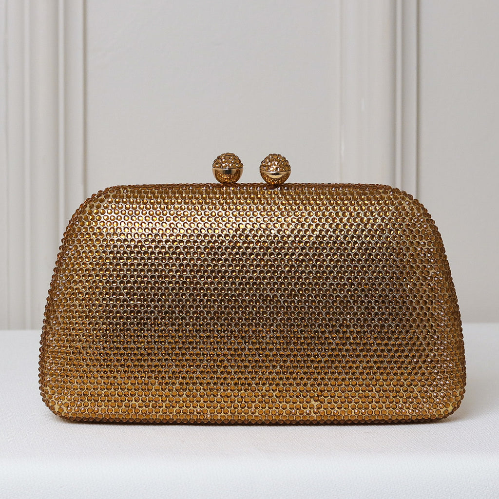 CLUTCH BRILHO STRASS FUNDO TECIDO FORMATO OVAL FECHO ESFERA
