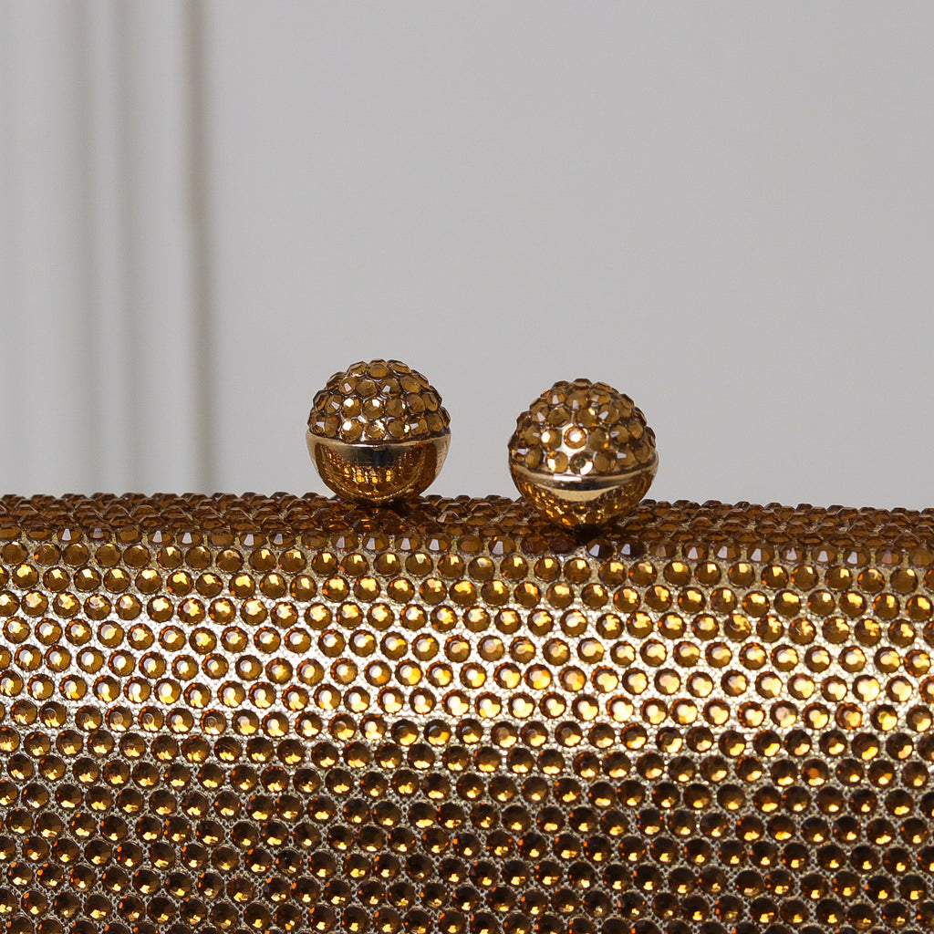 CLUTCH BRILHO STRASS FUNDO TECIDO FORMATO OVAL FECHO ESFERA
