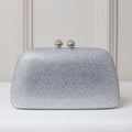 CLUTCH BRILHO STRASS FUNDO TECIDO FORMATO OVAL FECHO ESFERA