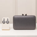 KIT FESTA: CLUTCH BRILHO ÔNIX + BRINCO FESTA PRETA